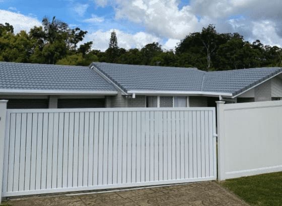 House With Fencing — SEQ Roof Repaints In Gold Coast